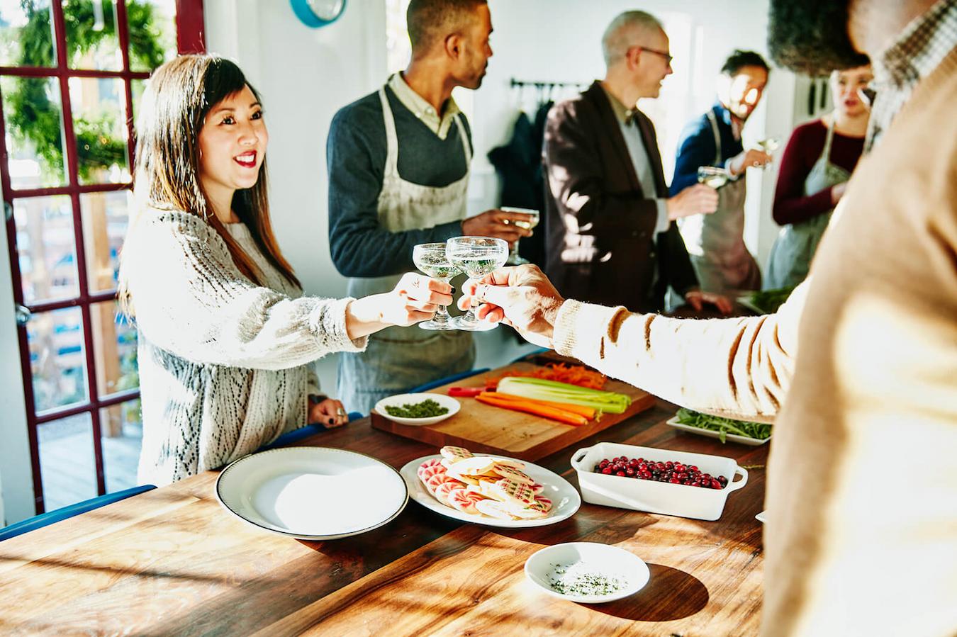 a group of people eating together team member gratitude wall thanksgiving gift thanksgiving celebration family members thanksgiving spirit