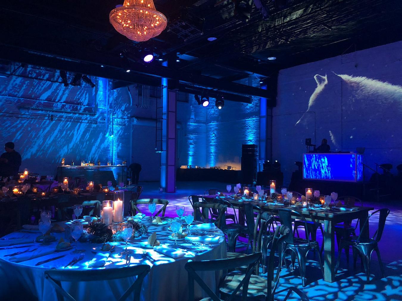 an event venue with blue lights high tech start planning business occasion entertainment match break assist range company