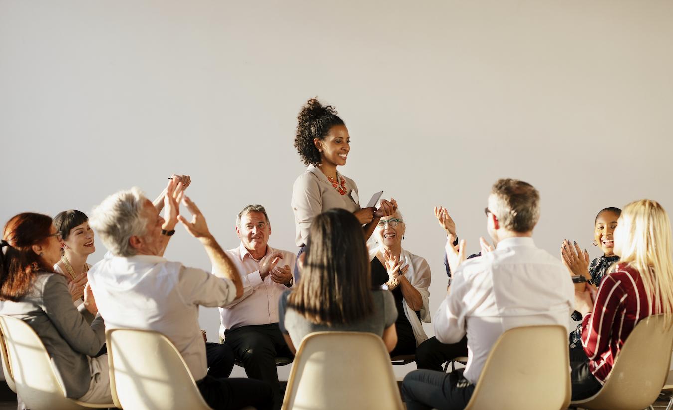 Event planning team celebrates successful event