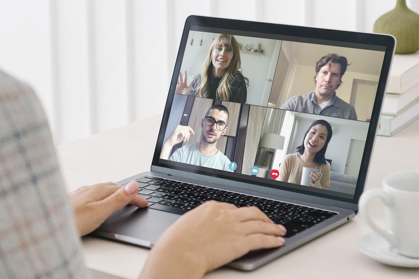 Group of employees connect over video conference
