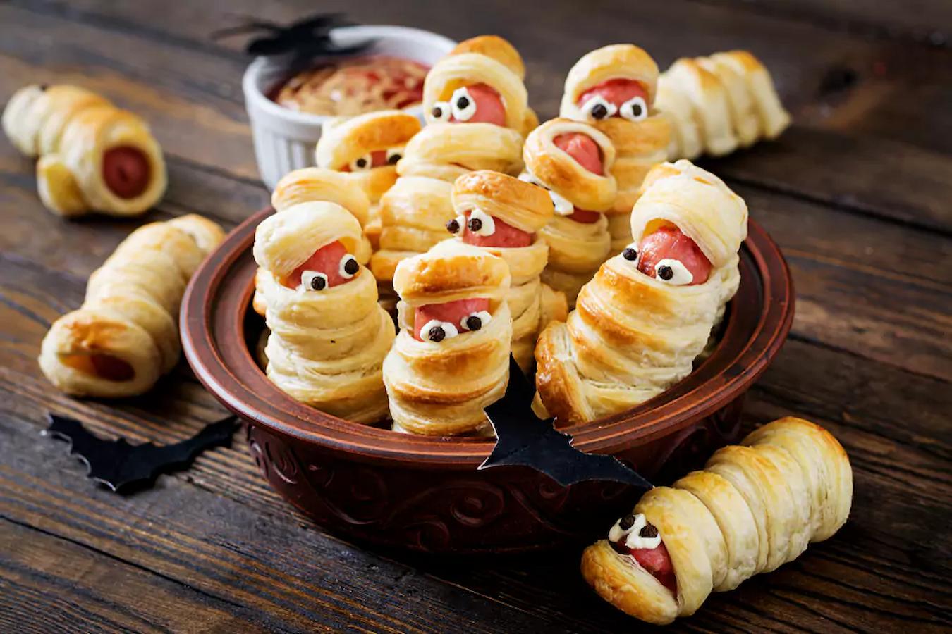 Halloween themed food pigs in a blanket party planning committee party favors old school party games toilet paper murder mystery scavenger hunt