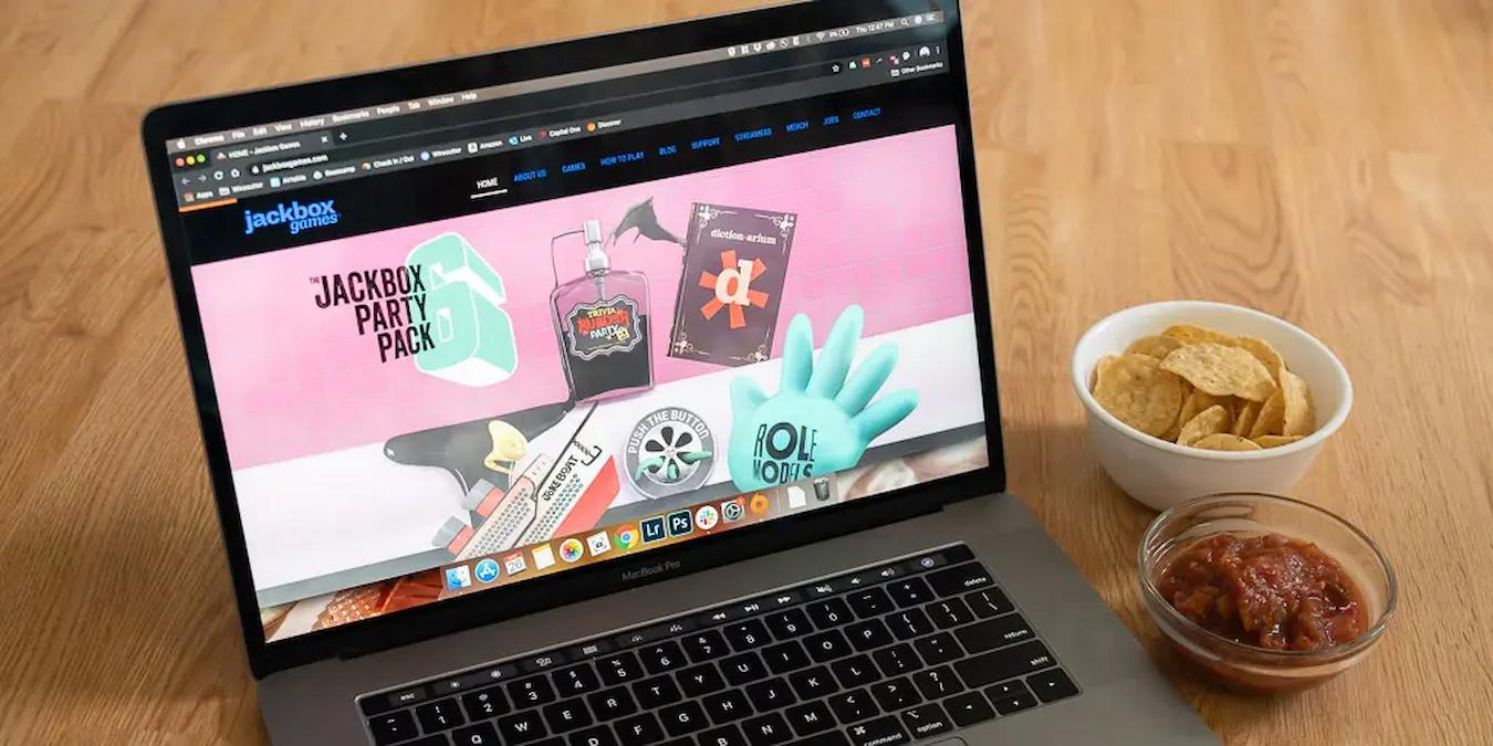 laptop with games on the screen fun virtual games online office games virtual game virtual games video calls in person virtual trivia happy hour online game virtual games employee engagement virtual dance party