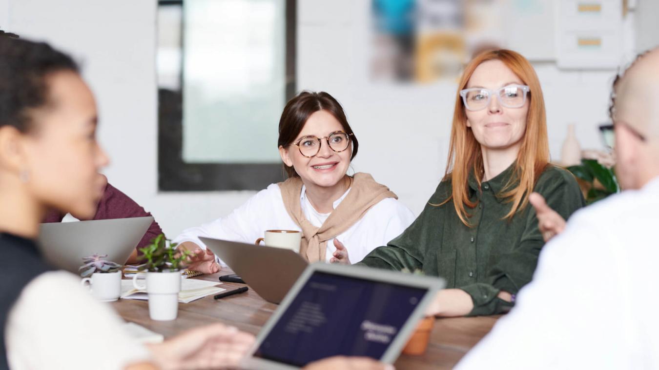 some employees having a meeting more ideas two truths problem solving fun ways accomplished idea