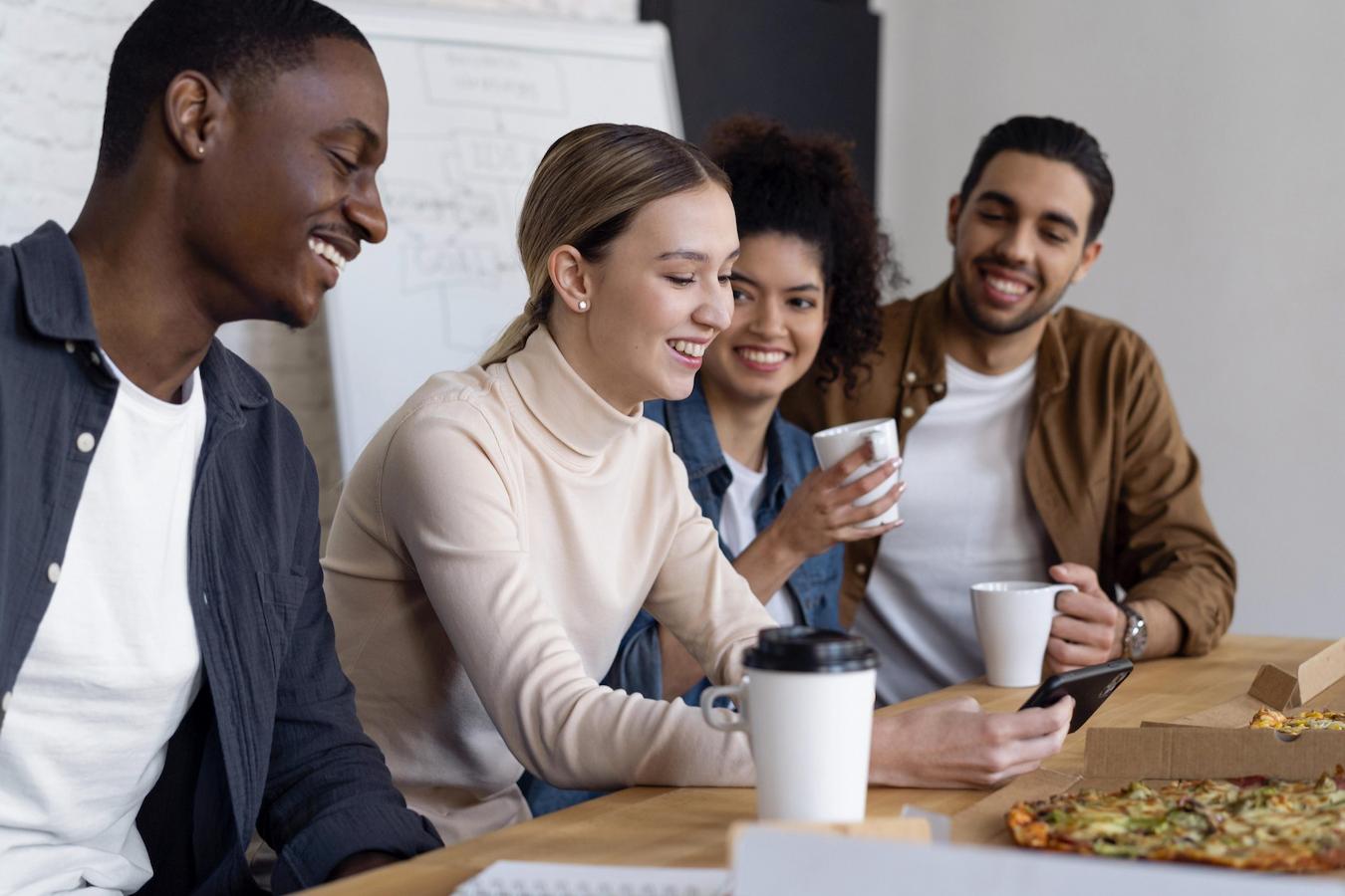 some employees sitting together eating pizza special holiday video conference collaborative holiday calendar shared holiday calendar not everyone easter bunny non mainstream holidays center floating holiday holidays holidays